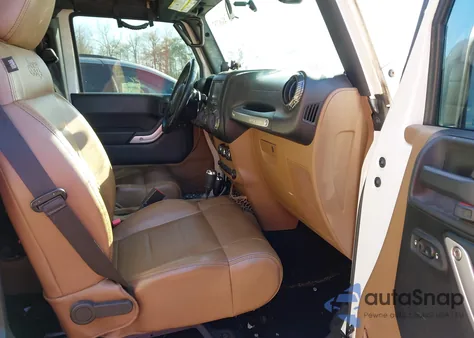 2012 Jeep Wrangler Unlimited Sahara z USA, uszkodzony, nr VIN 1C4HJWEG8CL227867